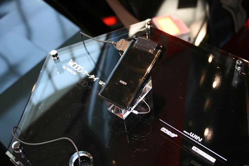 Illustration for article titled The KDDI Design Center's Futuristic Concept Phones and Less Impressive Regular Phones